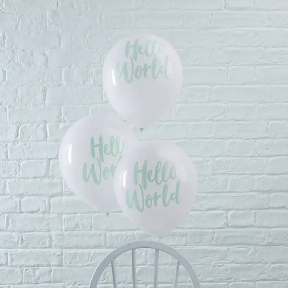 Drie witte ballonnen met daarop de tekst Hello World