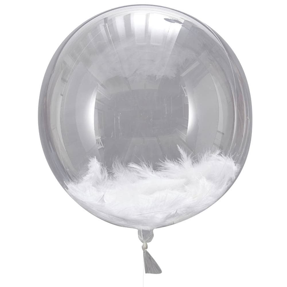 Grote transparante ballon gevuld met witte veren