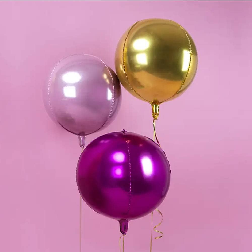 Grote ronde ballonnen in roze, goud en magenta