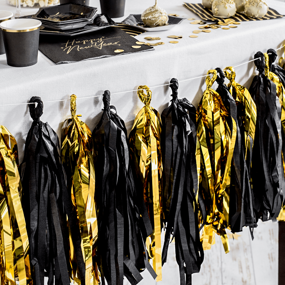 tasselslinger met zwarte en gouden tassels