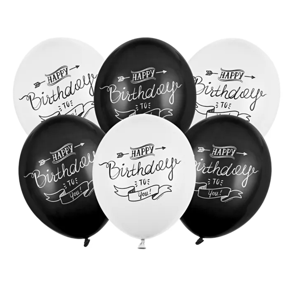 Zwarte en witte ballonnen met de tekst happy birthday to you