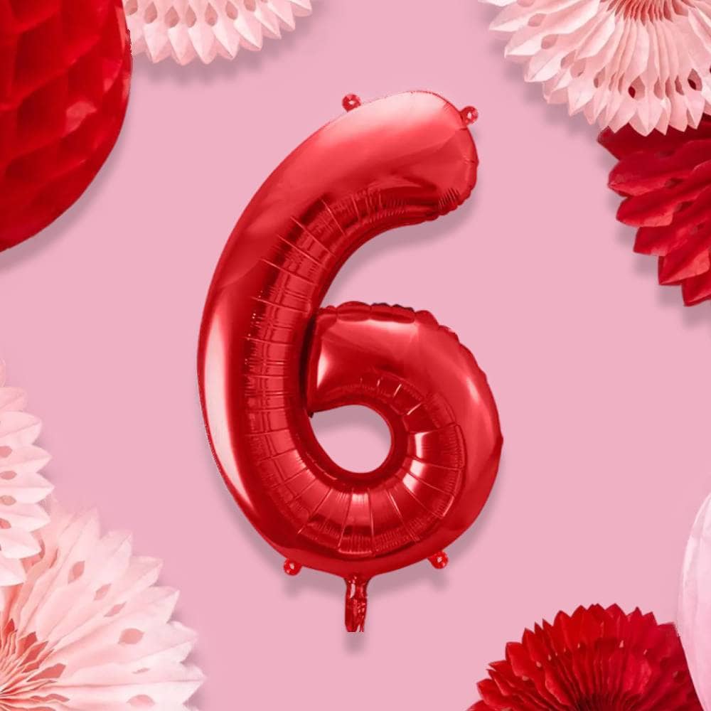 Folieballon cijfer 6 in het rood op een roze achtergrond met roze en rode honeycombs en waaiers