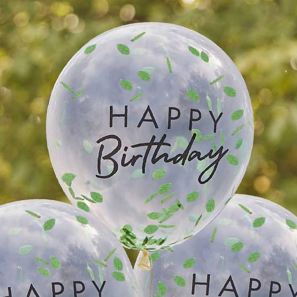 transparante ballonnen gevuld met confetti blaadjes met happy birthday erop