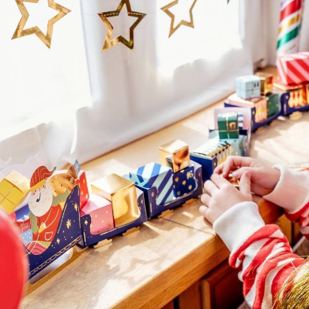 Do It Yourself Adventkalender met kerstman in zijn slee en cadeautjes