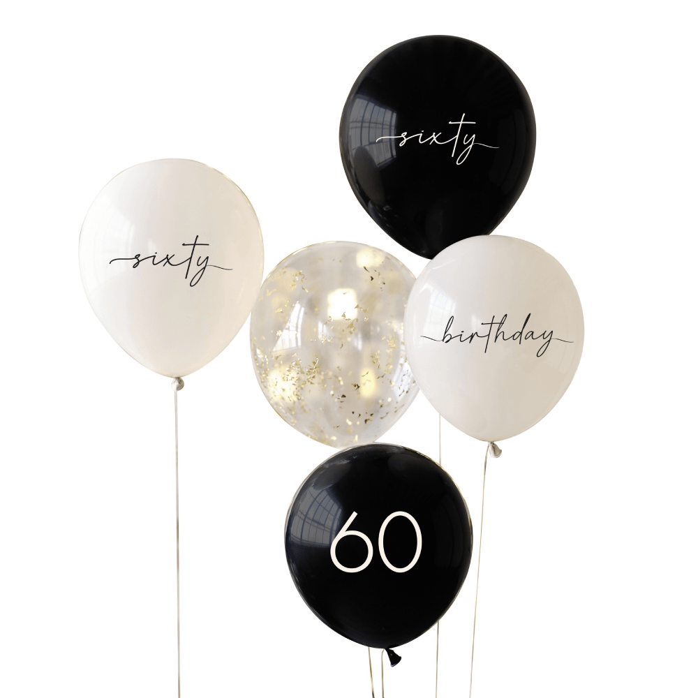 Ballonnen voor 60 jaar in het nude en zwart met gouden confettisnippers