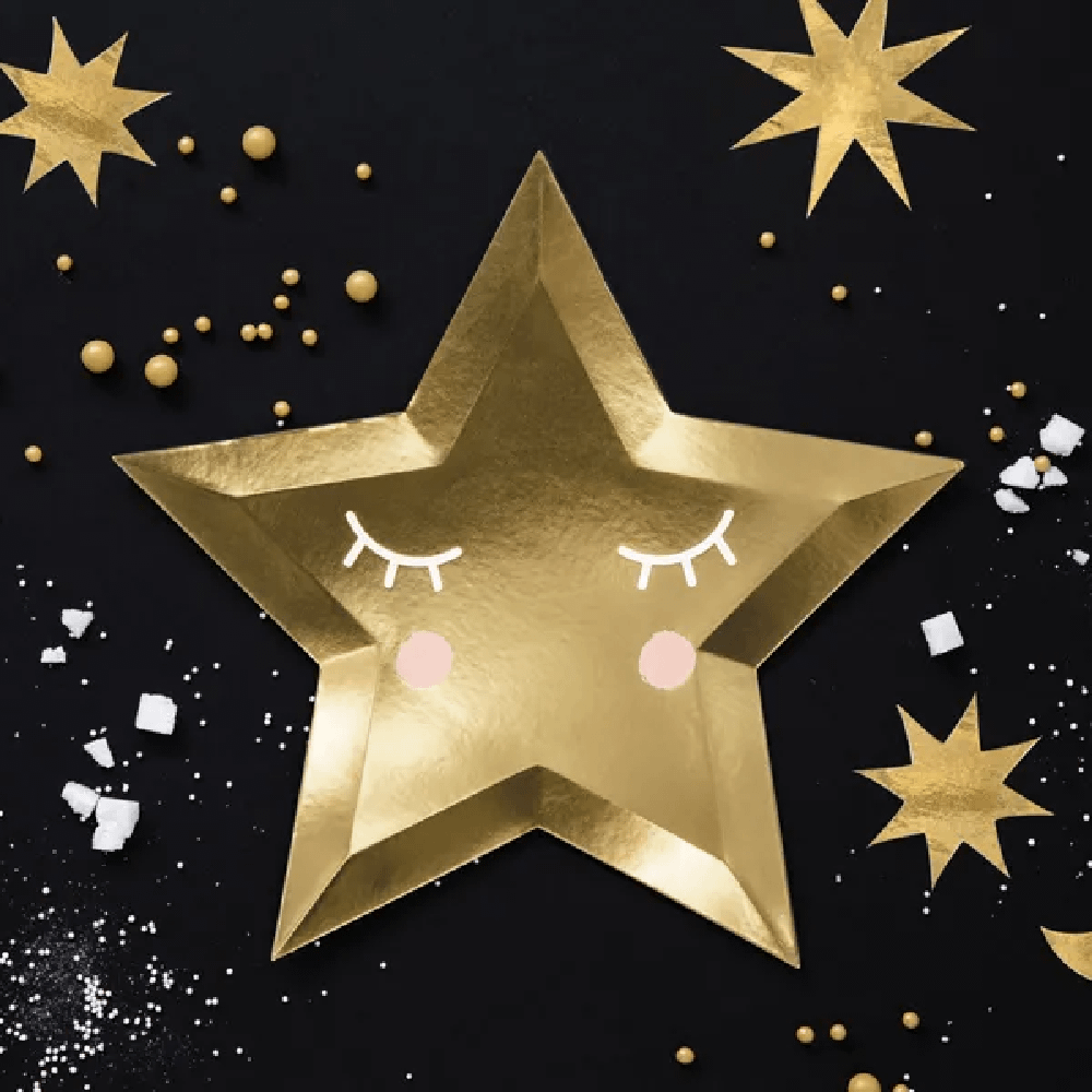 Gouden ster met gezichtje op een zwarte achtergrond versierd met gouden en witte confetti
