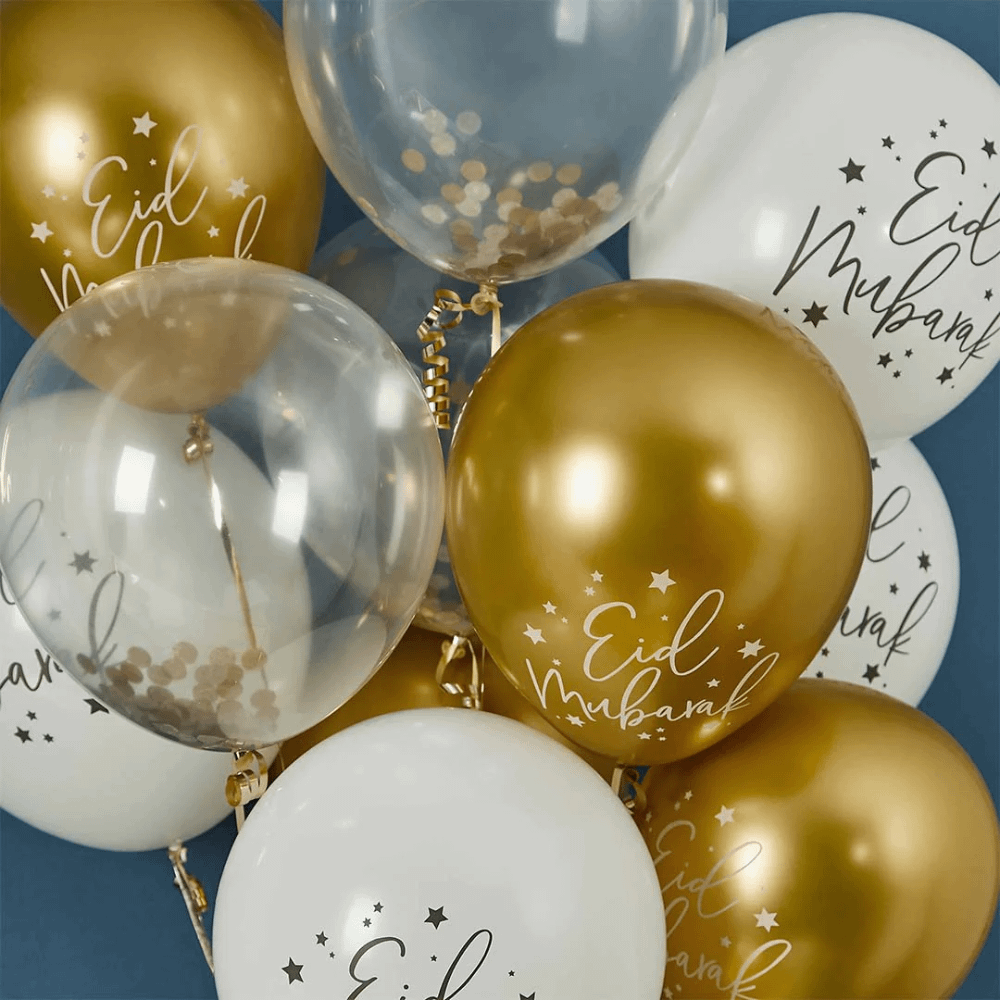 Witte en gouden ballonnen voor het Suikerfeest met hierop de tekst Eid Mubarak en transparante confettiballonnen