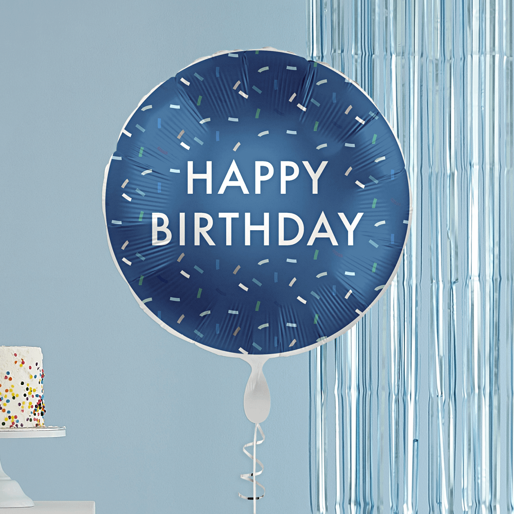 donkerblauwe folieballon met confetti en de witte tekst happy birthday
