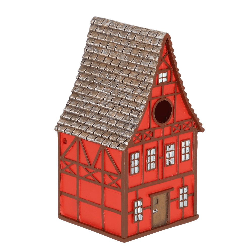 Rood huisje voor vogels in de stijl van een Duits vakwerkhuis