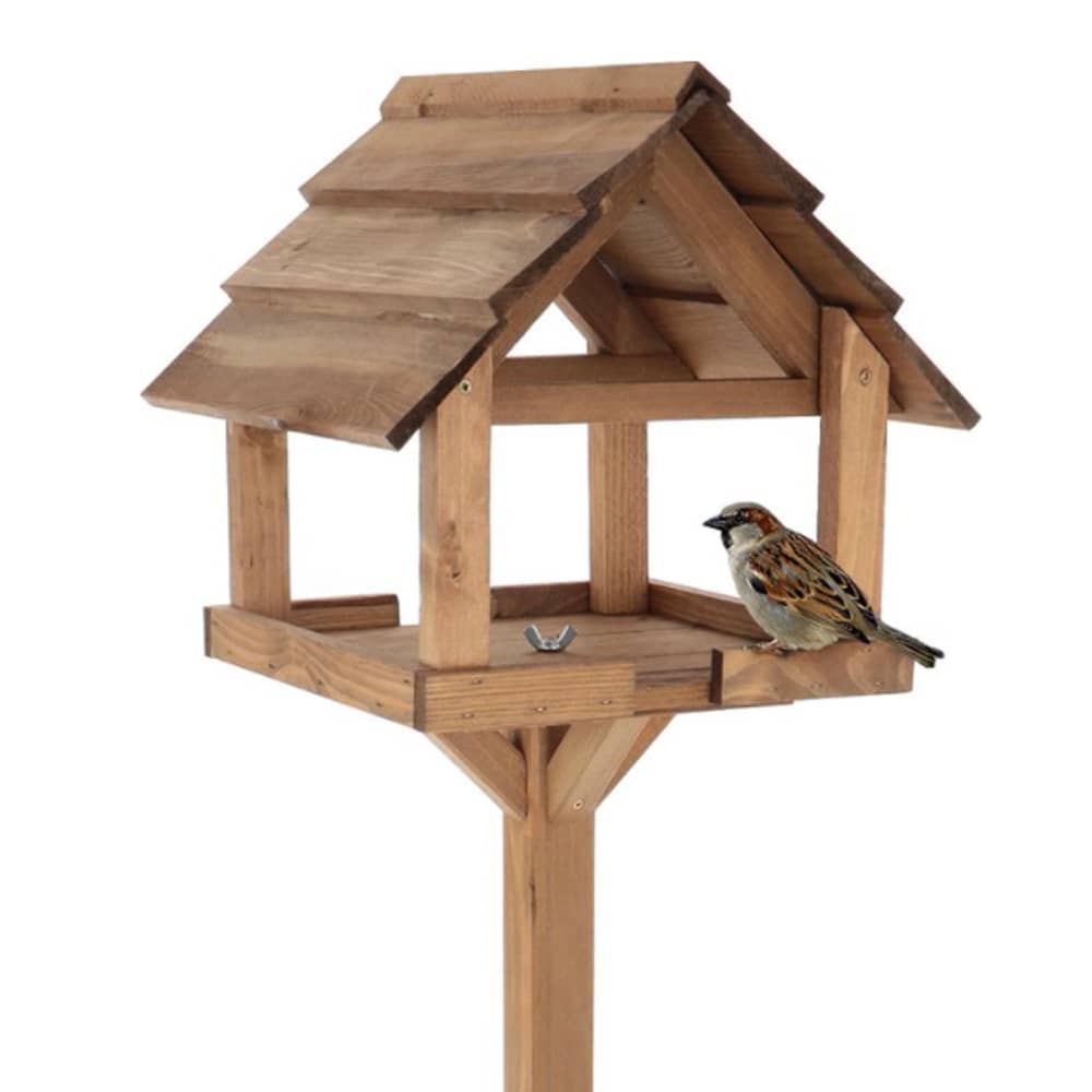 voeder huis op paal van hout met vogeltje