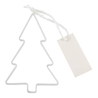 Wit tafelkaartje in de vorm van een kerstboompje