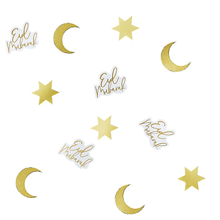 tafel confetti in de vorm van maantjes en sterren en de tekst Eid Mubarak