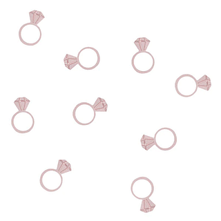 Rose gouden confetti in de vorm van diamanten ringen
