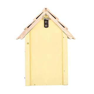 achterkant vogel huis met een geel strandhuis design