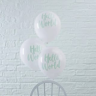 Drie witte ballonnen met daarop de tekst Hello World