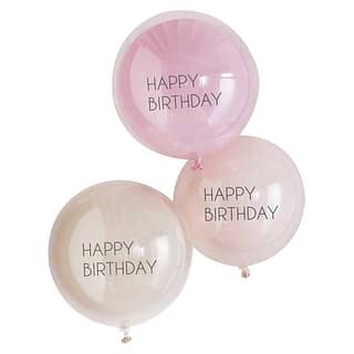 grote ronde ballonen met happy birthday erop in roze tinten