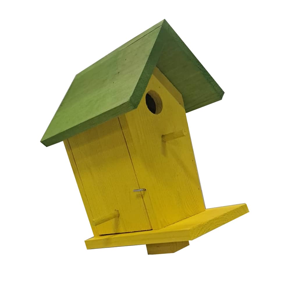 geel vogelhuis met groen dak